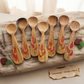 Handcrafted Set of 7 Hand-Painted Floral Motif Guayacán Wood Spoons